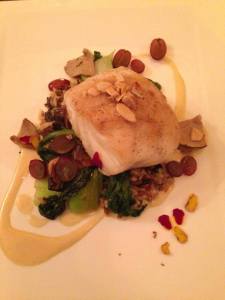 Grouper with almonds on top of wild rice, wild mushrooms, bok choy, grapes and horseradish with parnip puree